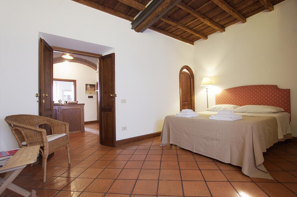 Апартаменты Vacanze Romane Centro Storico Trastevere Номер фото